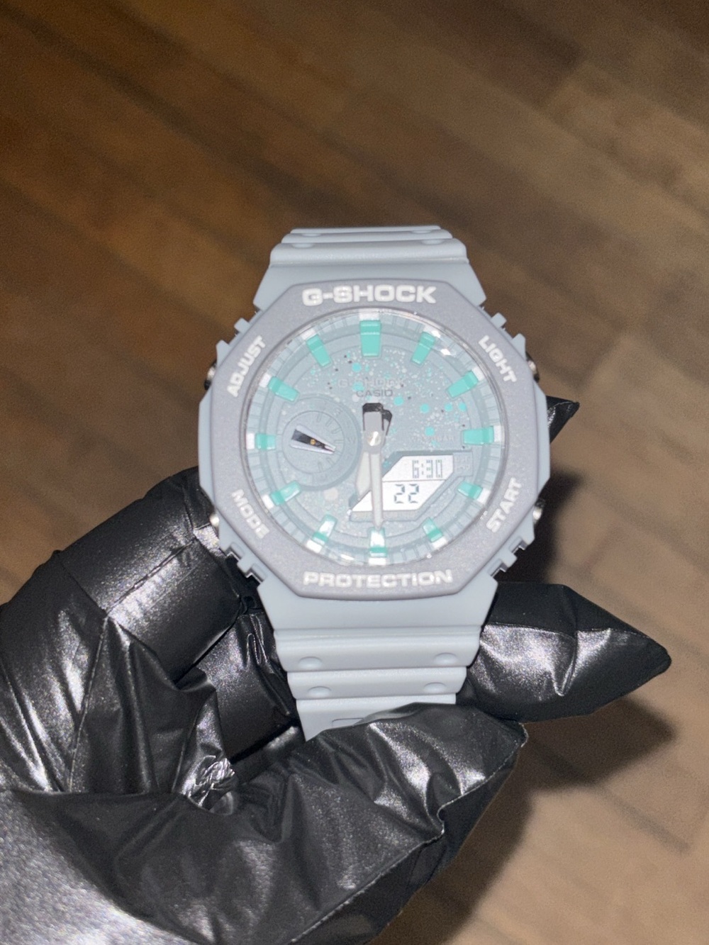 G-Shock Gray Watch with Teal Accents